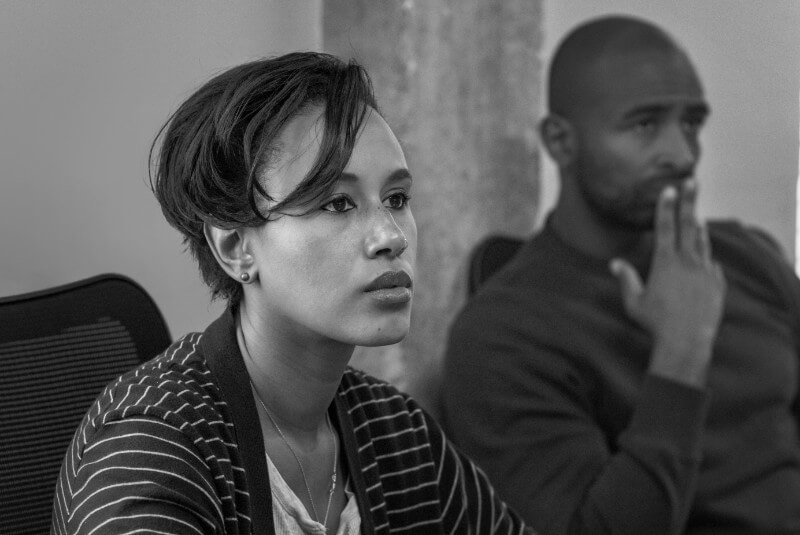 A man and woman in a screenwriting class